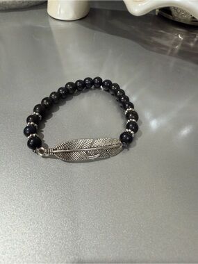 Black Beaded Bracelet with Silver Feather Accent